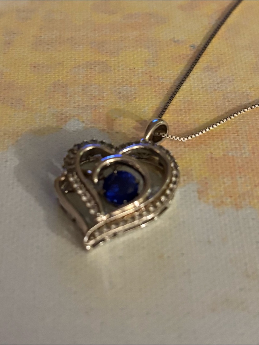 This beautiful sterling silver heart shaped with blue stone that dangles. 22.00 - Picture 4 of 6